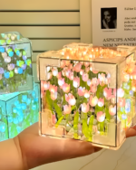 DIY Tulip Flower 3D Cube Lamp featuring illuminated floral design on a table.