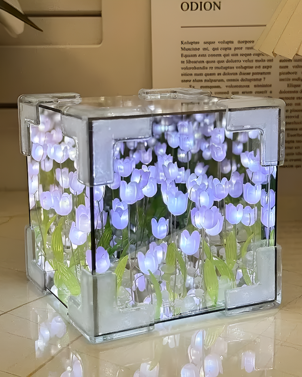 DIY tulip lamp featuring illuminated flower design inside a clear cube.