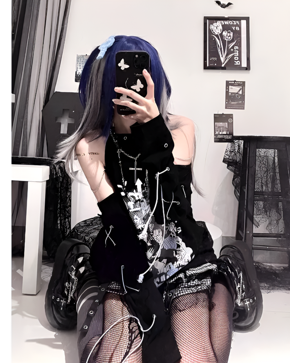 Model wearing a Dark Kanji Phantom Cold Shoulder Tee, a stylish dark anime tee with lace details and platform boots.