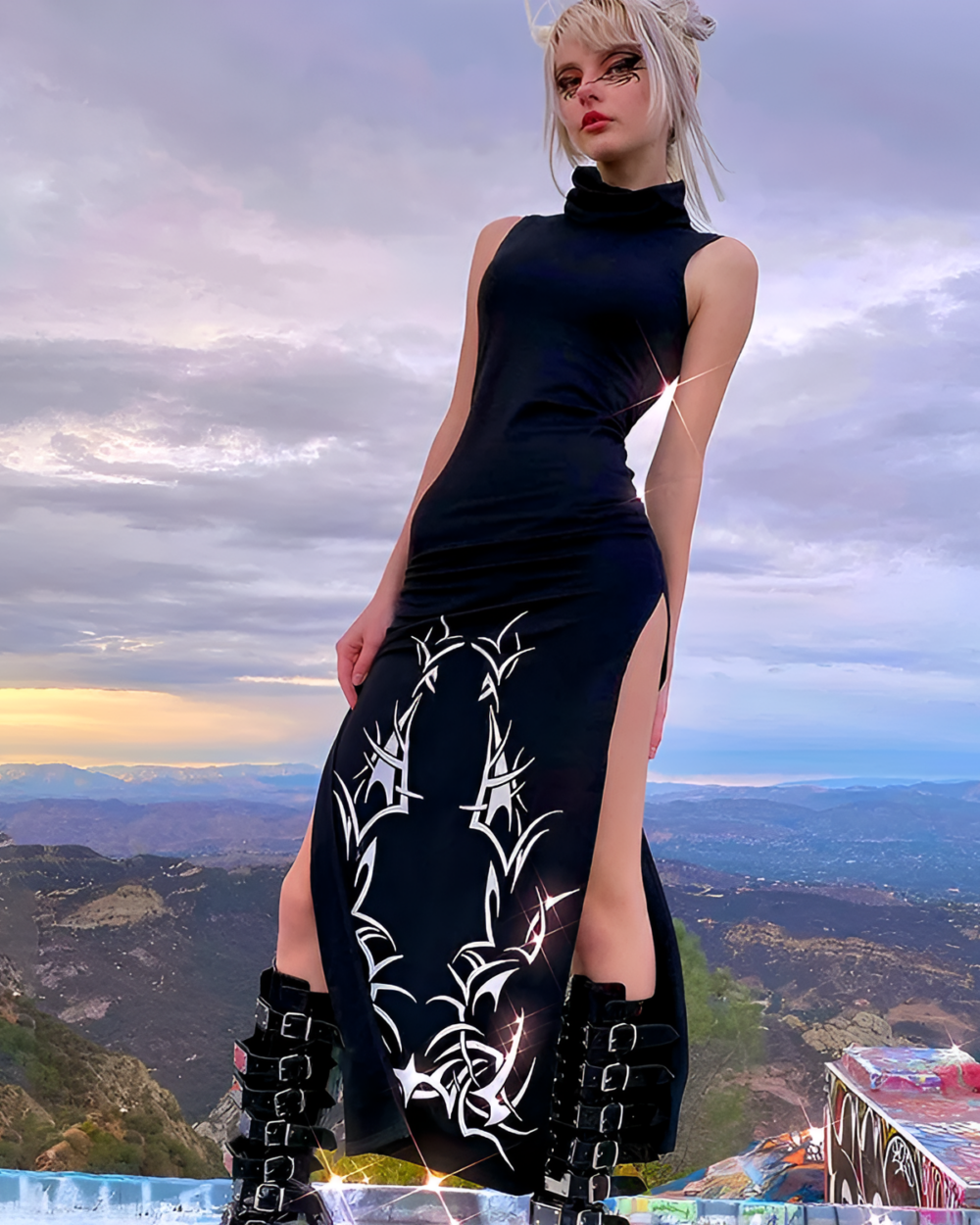 Dark Turtleneck Goth Dress featuring a high slit and tribal print, worn outdoors.