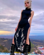 Dark Turtleneck Goth Dress featuring a high slit and tribal print, worn outdoors.