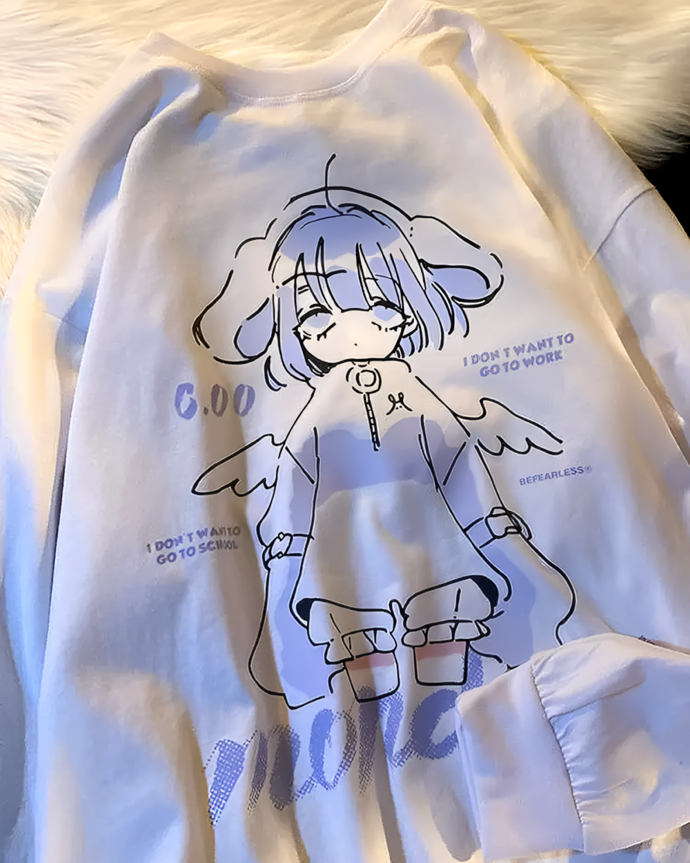 White t-shirt featuring the Drowsy Cherub Graphic Tee design with a cartoon angel and text.