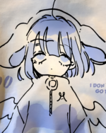 Close-up of a Drowsy Cherub Graphic Tee design featuring a line art illustration of a cherub against a blue background.