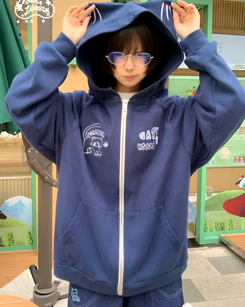 Navy Eared Hoodie - Harauku Aesthetic with cartoon design on front.