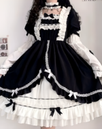 Black and white bowed maid dress with lace details and ribbons.