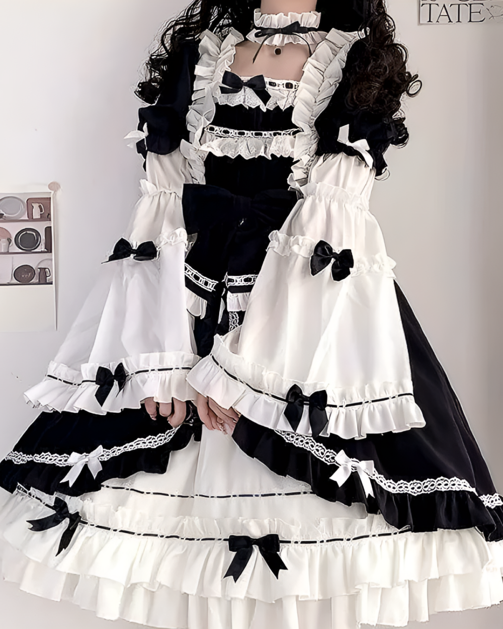 Black and white bowed maid dress with ruffles and bows. Exclusive bowed maid dress.