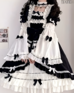 Black and white bowed maid dress with ruffles and bows. Exclusive bowed maid dress.