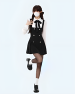 Black and white fake two-piece dress with a pleated skirt and matching blazer.