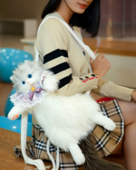 Fluffy Chonker Bag, a cute cat backpack, being carried by a woman.