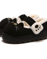 Black Fluffy Mary Jane slippers with cat faces and plush lining.