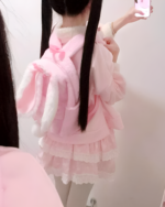 Pink Fluffy Rabbit Eared Backpack Jojifuku, worn by a person.