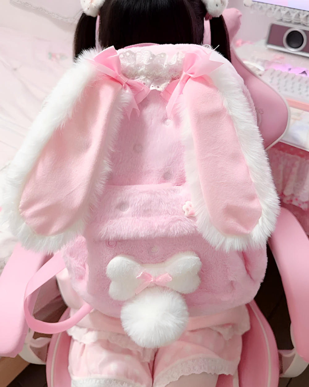 Pink rabbit eared backpack with fluffy ears and bow, Jojifuku.