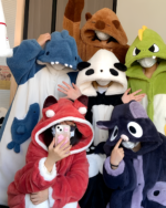 Group showcasing the Fluffy Robes Collection - Kigurumi Edition. Features various animal designs like dinosaur and cat Fluffy Kigurumi.