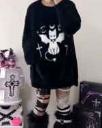 Black Gothic fluffy sweater featuring a skull and crossbones design.