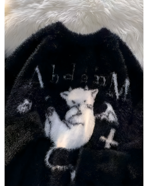 Black Gothic fluffy sweater with a cat graphic.