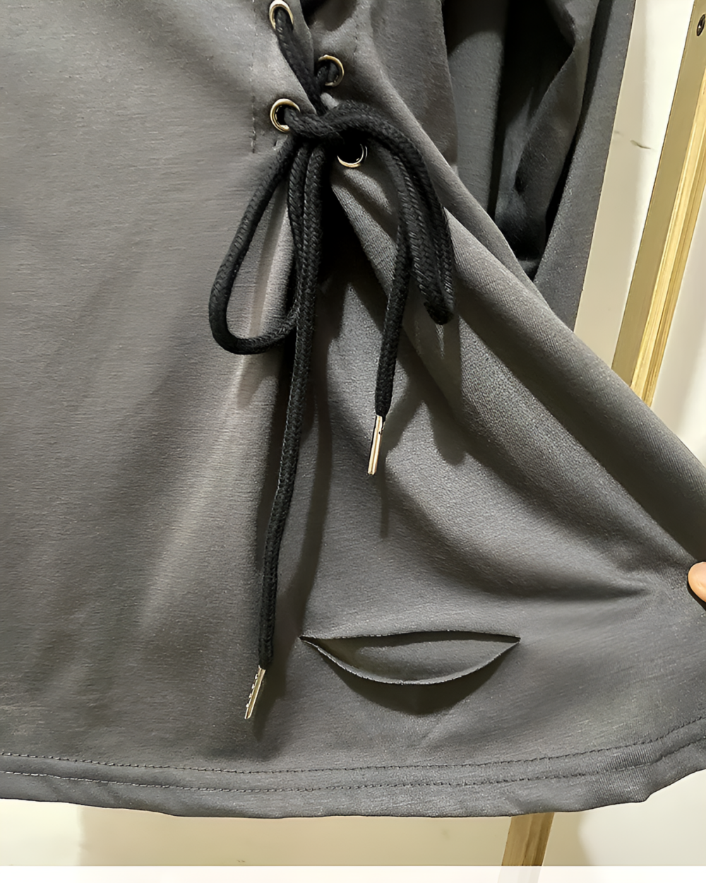 Black Grunge-Style Dress with drawstring accents and a side pocket.