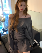 Woman wearing a black Grunge-Style Dress with lace detailing.