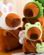 Close-up of Hatted Capybara Plushies - Squeaky Purse Edition, featuring brown capybara plushie toys wearing different hats.