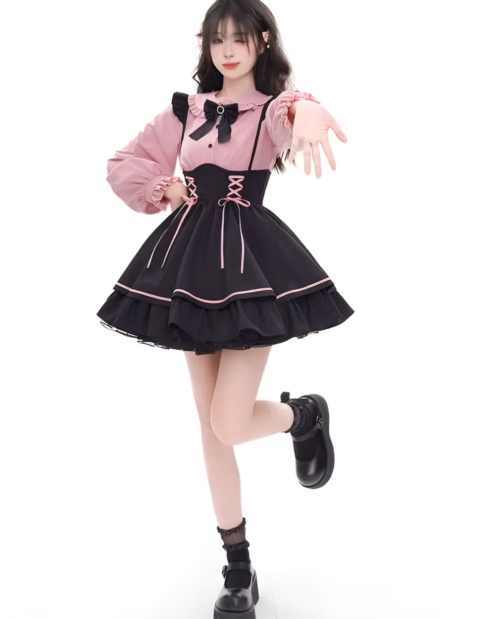 Model wearing a Heartache Lace-Up Pinafore Coord, a Jirai Kei outfit featuring a black and pink ruffled dress with a lace-up bodice.