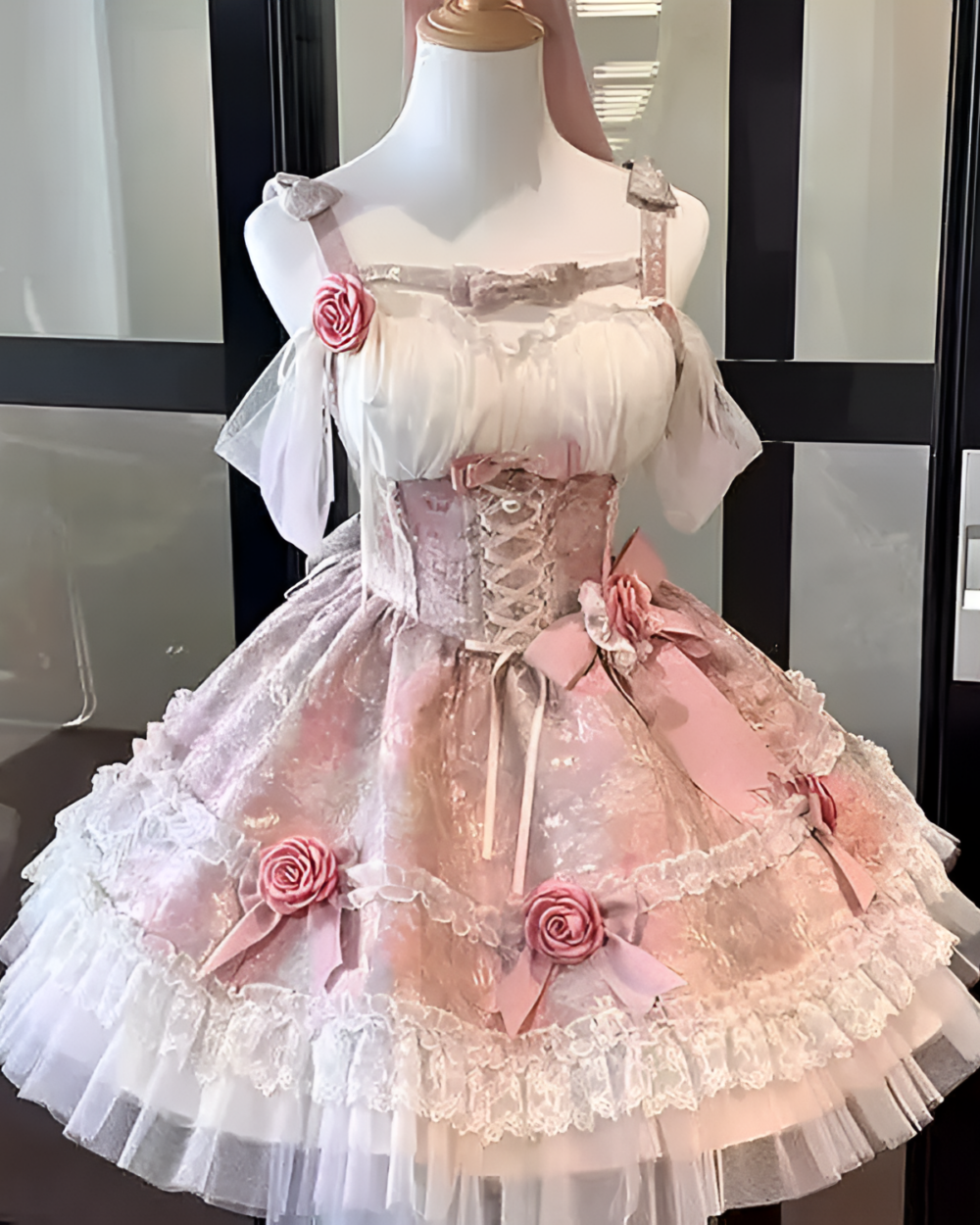Pink Hime Lolita Dress on a mannequin, featuring lace, ruffles, and rose details.