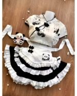 Inkwell Panda Maid Dress with a panda plushie. This stylish outfit features a black and white panda design, including a cheongsam-style top and ruffled apron.