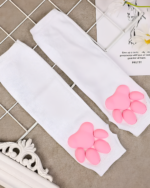 White 3D cat paw sleeves with pink paw pads. Kawaii arm warmers for a playful look.