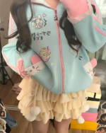 Light blue kawaii bunny cardigan with pastel accents and a zipper closure.