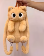 Close-up of a Kawaii Cat Plushie Backpack, a plush yellow bag designed like a cat with large eyes.