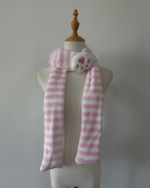 Pink and white striped Kawaii Neko Paw Scarf displayed on a mannequin. Soft, fluffy texture with a cat paw detail.