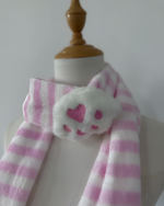 Pink and white striped Kawaii Neko Paw Scarf with a fluffy paw print detail, displayed on a mannequin.