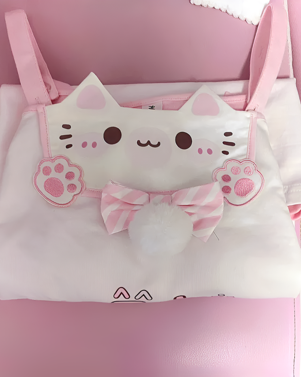 Kawaii Fuwa Fuwa Bunny T-Shirt, plush bunny bag with bow and paw prints.