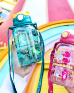 Close-up of a cute water bottle featuring a bear design and colorful illustration.