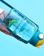 A transparent cute water bottle featuring a cartoon bear and dinosaur design.