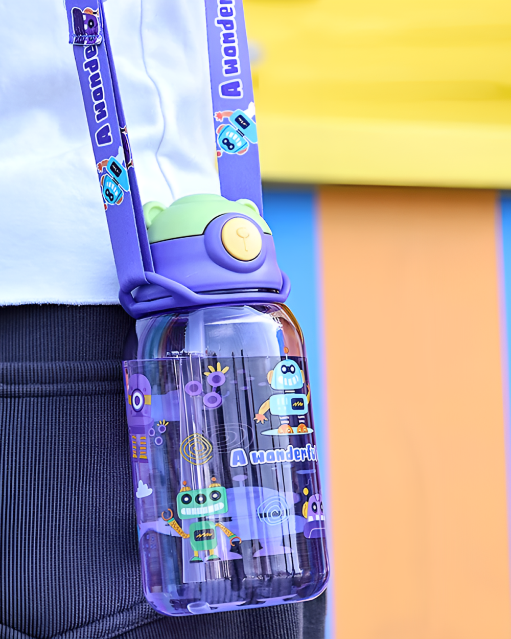 A purple cute water bottle with a bear design and playful graphics.