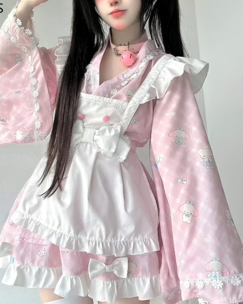 Kawaii lolita style dress featuring a pink and white ruffled design with cute animal motifs.