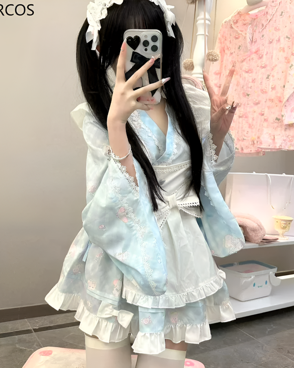 Model wearing a Kawaii Lolita Style Ruffled Maid Dress, featuring ruffles and floral details.