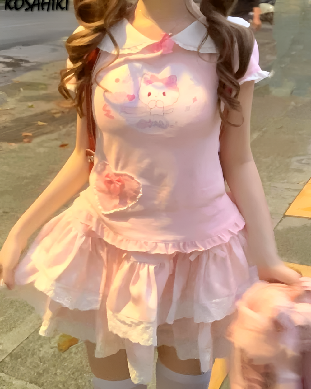 Pink Kawaii Neko Pink Tee outfit with ruffled skirt and thigh-high socks.