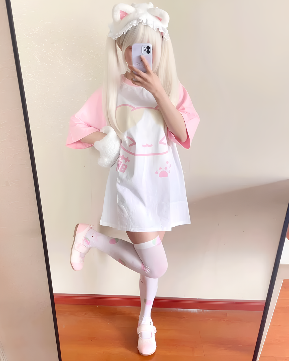 Woman wearing a Kawaii Neko T-Shirt and matching accessories.