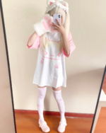 Person wearing a Kawaii Neko T-Shirt, pink socks, and cat ears for a Yume Kawaii aesthetic selfie.
