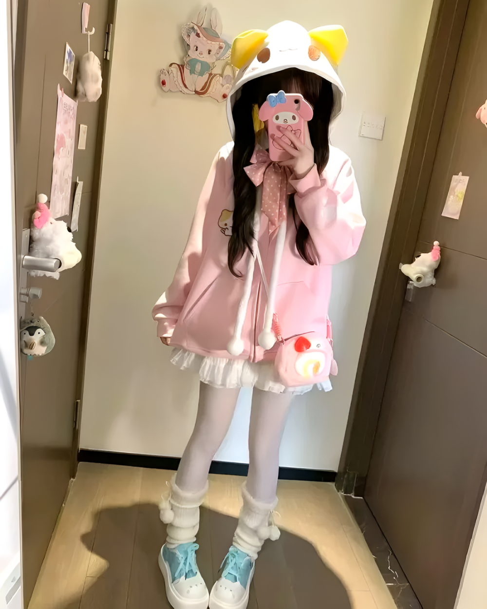 Pink Kawaii Neko Hoodie worn by a person indoors.