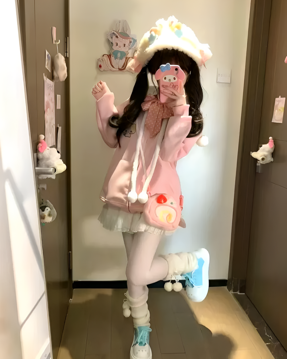 Pink Neko Hoodie worn by a person, featuring cute cat ears and a plush design.