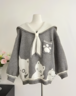 Kawaii Sailor Pullover Sweater on a mannequin, featuring cat embroidery and a bow detail.