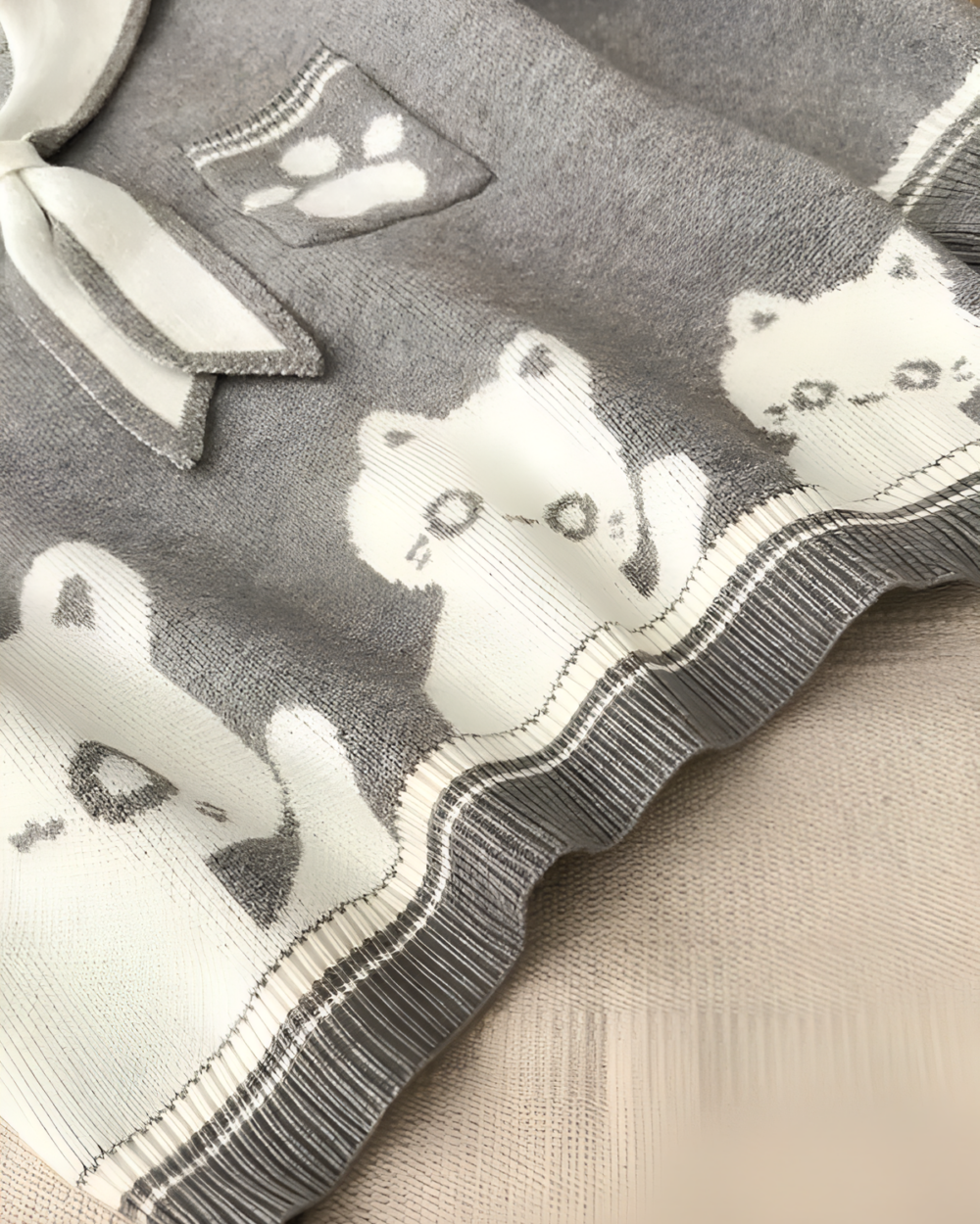 Close-up of a Kawaii Sailor Pullover Sweater featuring white and gray bear illustrations.