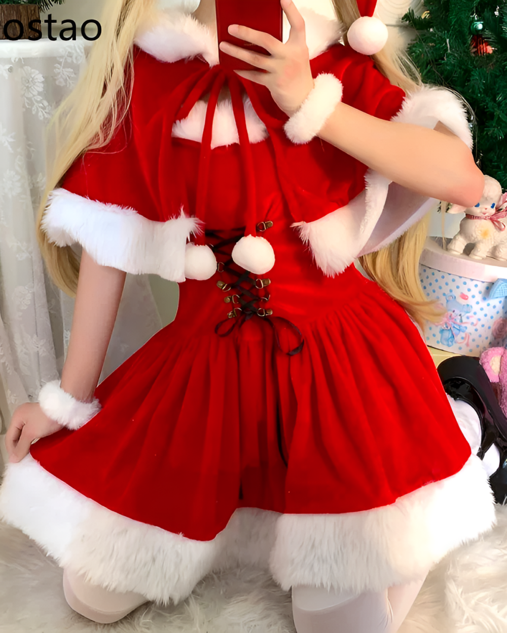 Image of a red Kawaii Shawl Winter Dress with white fur trim and a lace-up bodice. Perfect for winter holiday events.