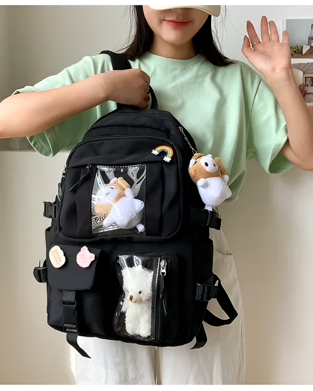 Kawaii Vinyl Pockets Backpack showing clear vinyl compartments with plush toys and accessories.