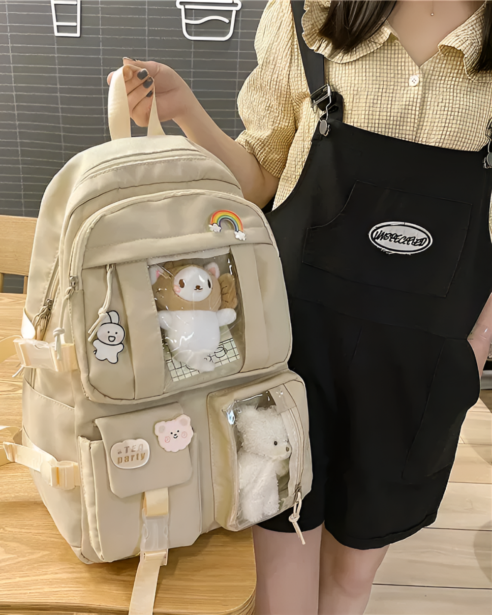 Kawaii Vinyl Pockets Backpack showing a clear vinyl design with cute character embellishments.