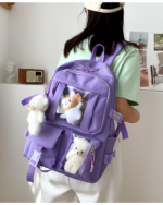 Kawaii Vinyl Pockets Backpack featuring clear vinyl pockets and stuffed animals.