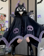 Person wearing a black Kawaii Winged Eared Plush Cape with a bat design and lavender trim. The cape has attached ears and wings.