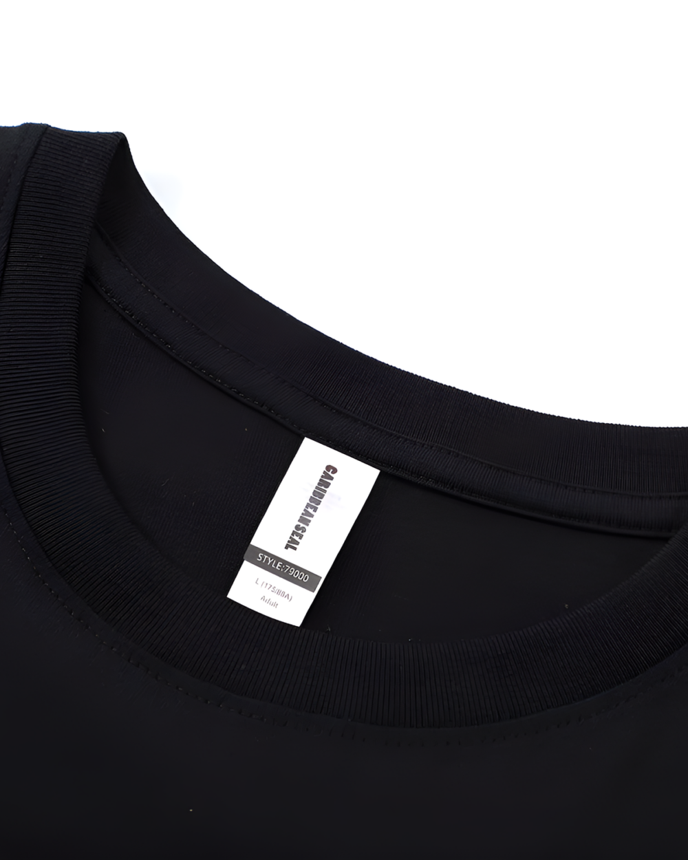 Close-up of a black Chaos Neko Explosion Tee showing the neck label and fabric texture.