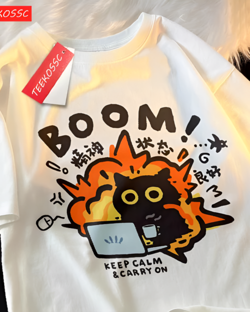 White tee with a colorful print featuring a cat and text. Showing the Chaos Neko Explosion Tee design with "Keep Calm & Carry On".